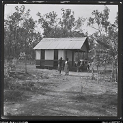Women and children outside a house on Elcho Island, Northern Territory, 1958?